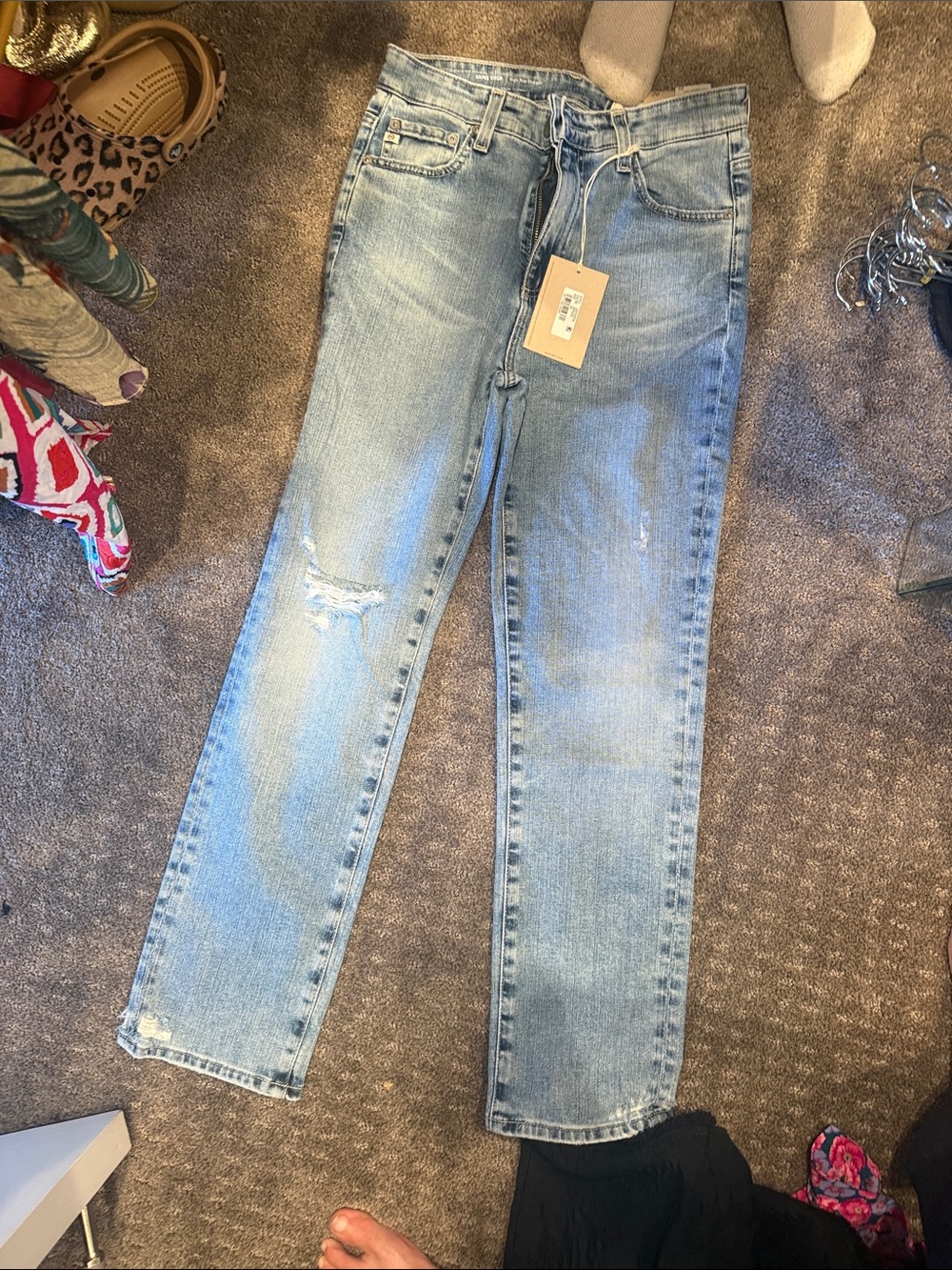 AG Adriano Goldschmied Light Blue Skinny Jeans with Knee Distress